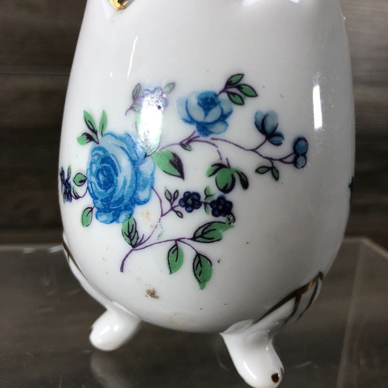 Small Cracked 3 Footed Porcelain Egg Painted With Blue Roses Candle Holder